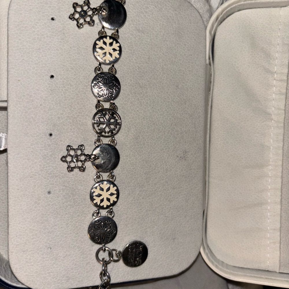 Silver Charm Bracelet with Snowflake and Geometric Designs